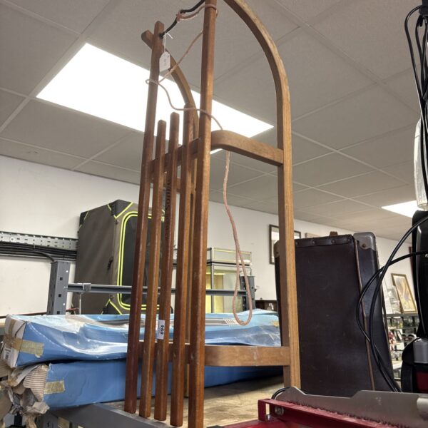 Vintage wooden snow sled from Davos, a classic winter antique.