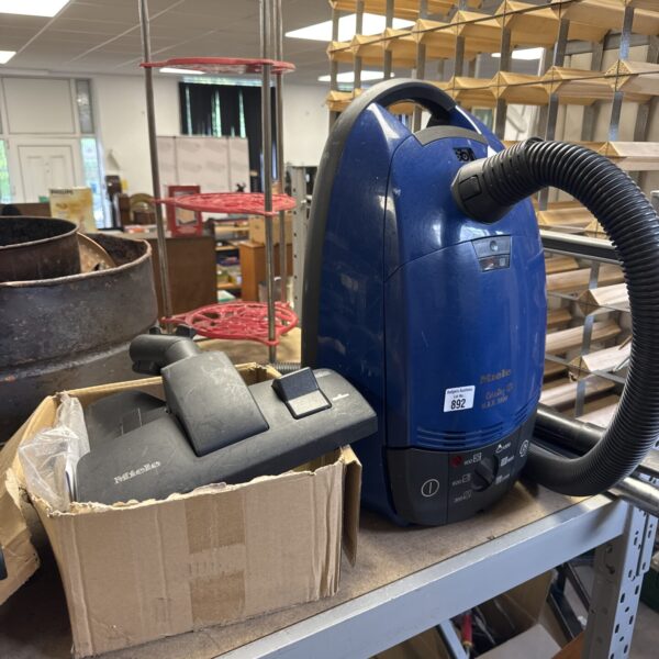 Miele Cat and Dog Max 2000 hoover with attachments for pet hair removal.