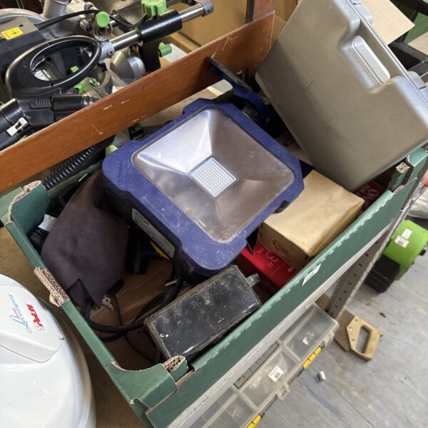 Garage clearance lot with vintage try square and various tools.