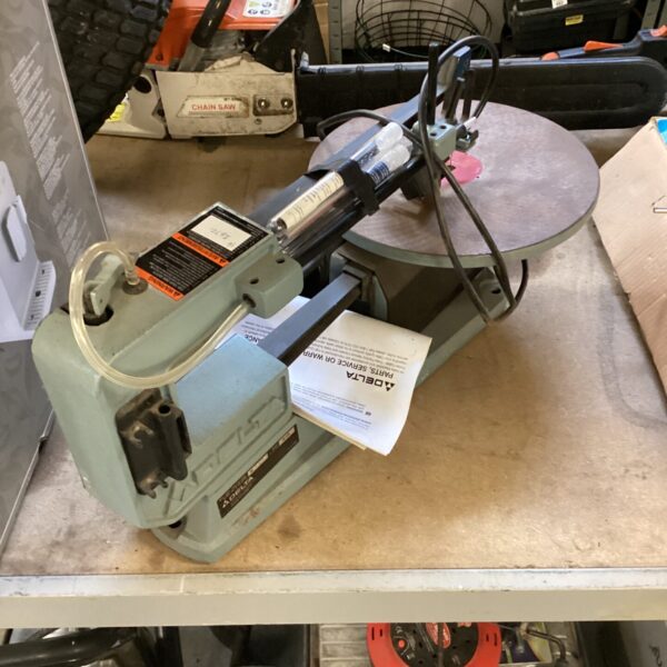 Vintage Delta 16 inch scroll saw for woodworking projects.