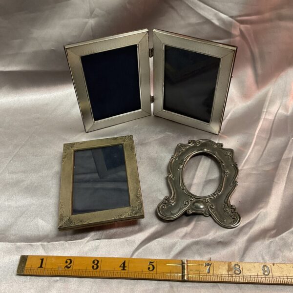 Lot of three vintage silver photo frames.