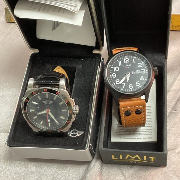 BMW Mini and Limit quartz watch pair on display.