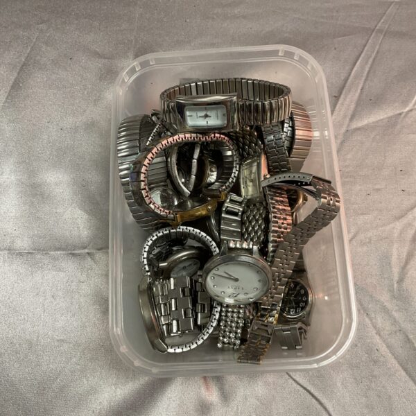 Tray of assorted vintage and broken wristwatches for repair.
