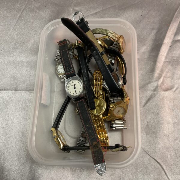 Tray of assorted vintage and broken wristwatches for repair.