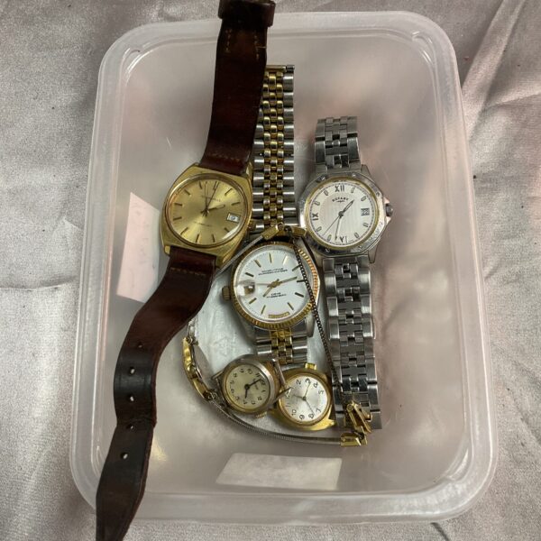 Tray of vintage wristwatches including a Rotary watch.
