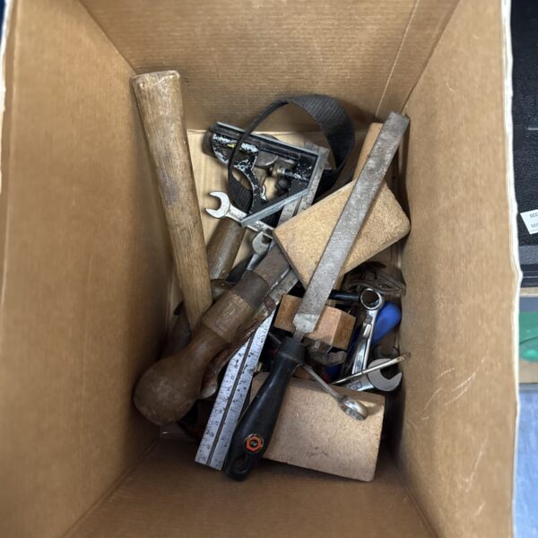 Assorted vintage hand tools in a mixed lot for DIY projects.