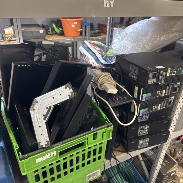 Mixed lot of used office computers and monitors for sale.