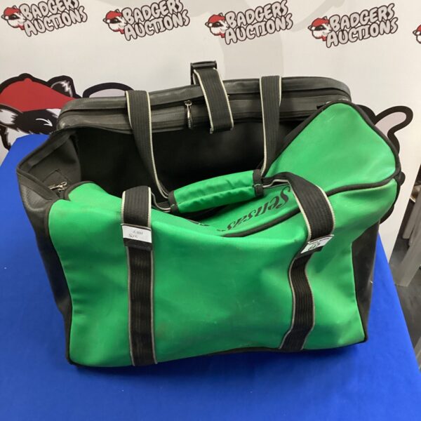 Front view of a used Sensas fishing bag with a carry handle.