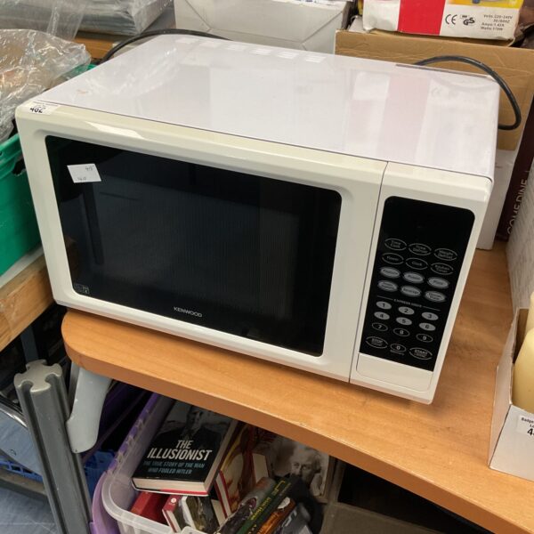 White Kenwood microwave oven on a countertop.