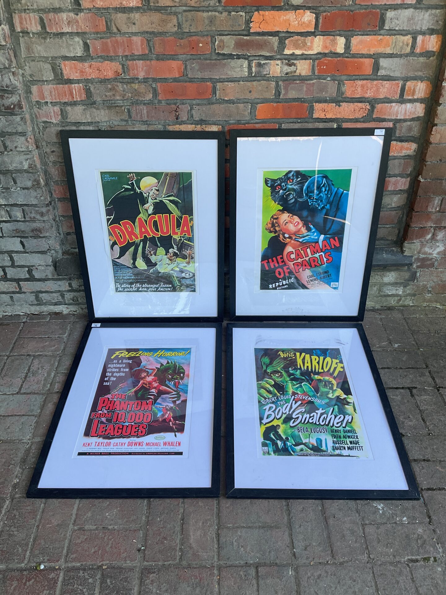075 Set of four framed horror movie poster prints including dracula
