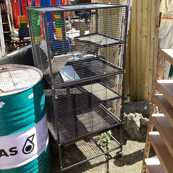 Wire mesh small animal cage with multiple levels.
