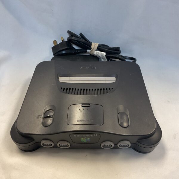 Front view of a vintage Nintendo 64 console with power supply.