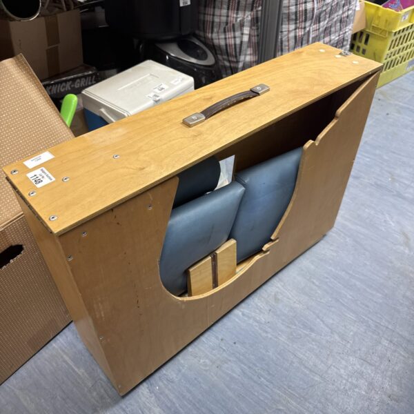 Blue folding massage table, portable therapy bed.