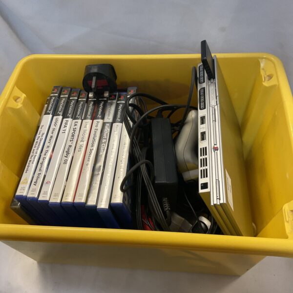 Silver Sony PlayStation 2 slim console bundle for retro gaming.