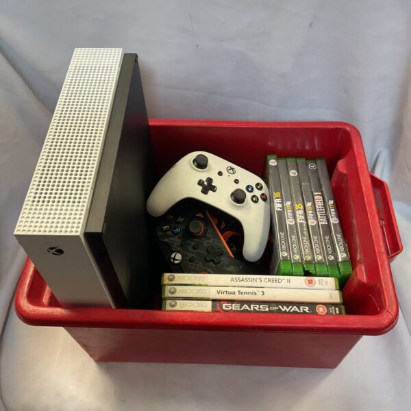 Front view of a black Microsoft Xbox One console bundle with controller.