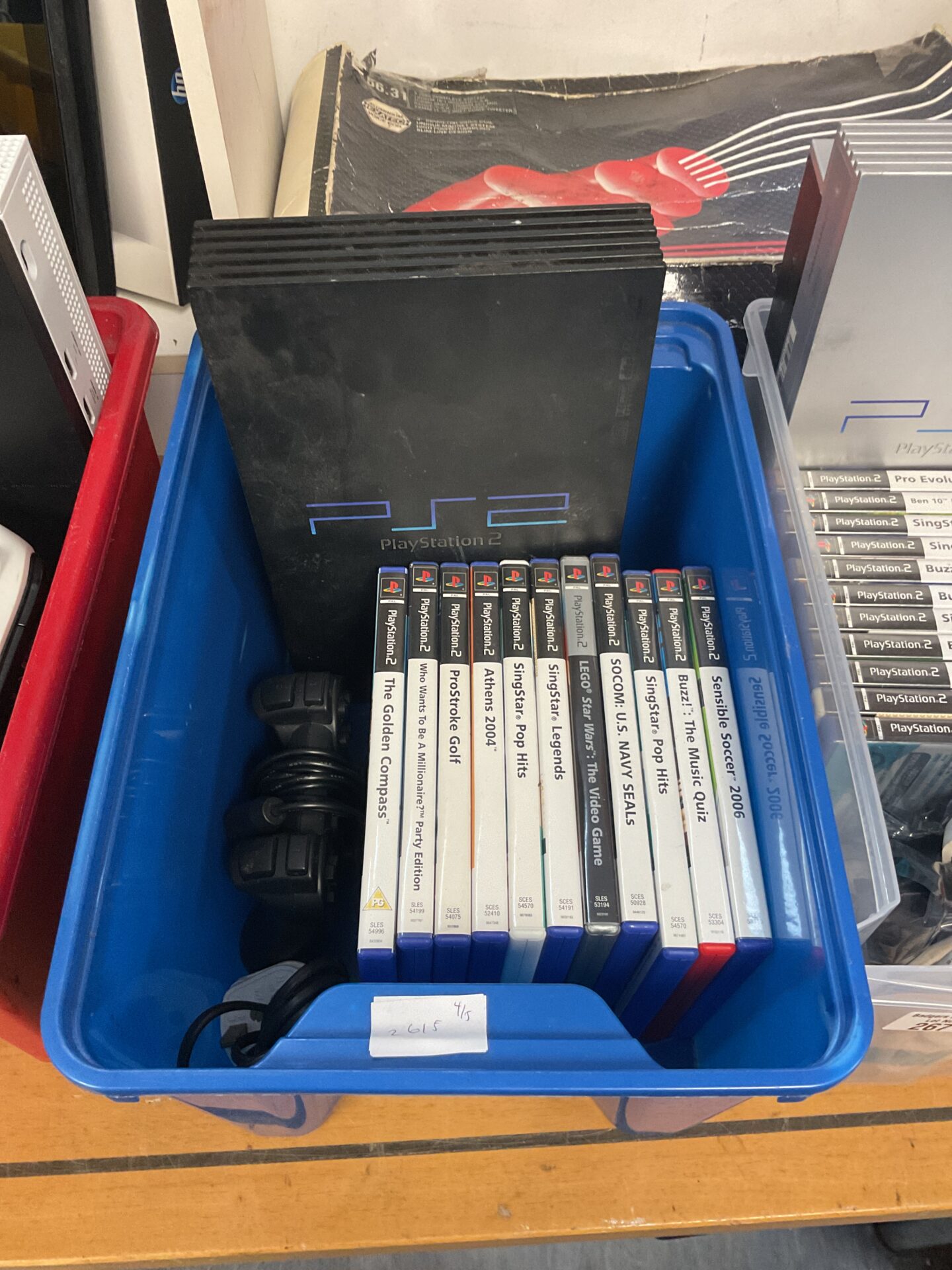 265 Sony PlayStation 2 console with games