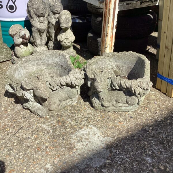 Vintage concrete deer garden planters for outdoor display.