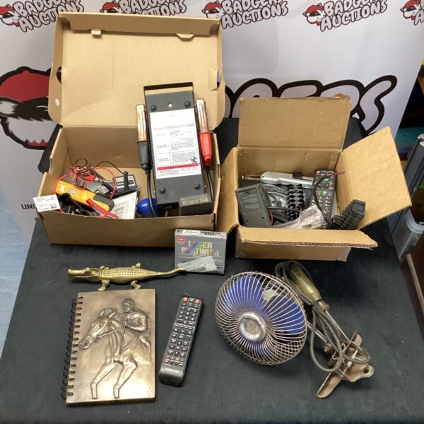 Mixed lot of battery testers, crocodile clips, and LED lighting strips.