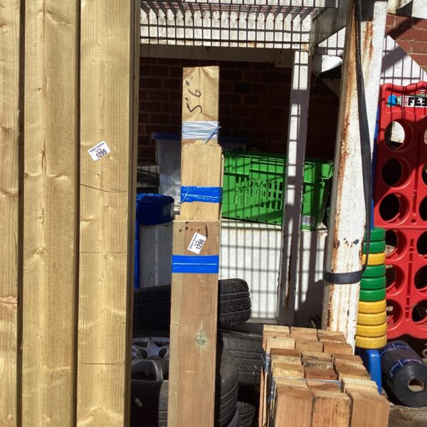 Three bundles of timber, 5’6” long, ready for construction projects.