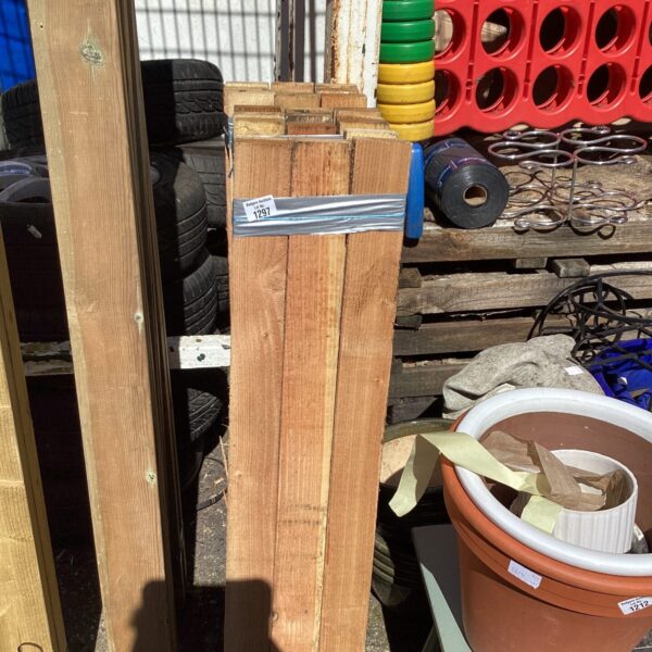 Three bundles of 4ft timber for construction and DIY projects.