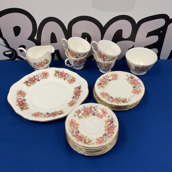 Vintage Colclough floral teacup set with delicate porcelain details.