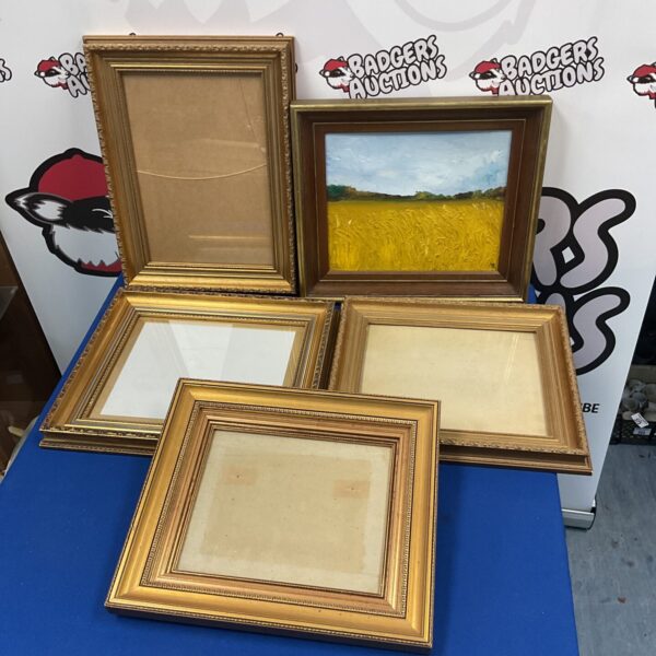 Lot of five vintage gilt picture frames for wall decor.