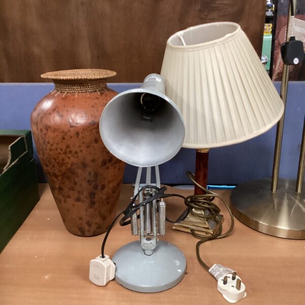 Vintage Anglepoise lamp with African urn and brass table lamp collection.