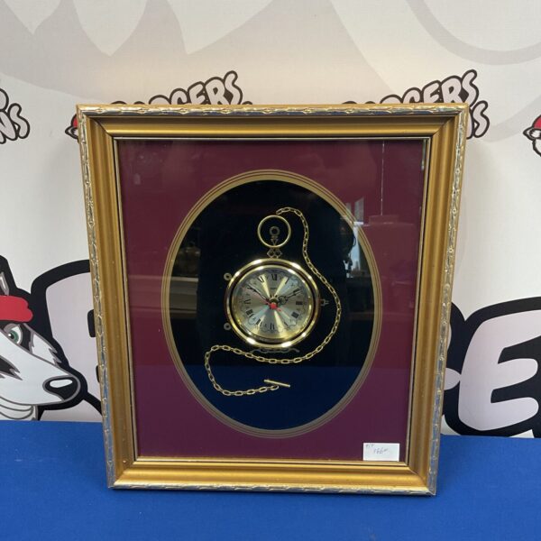 Gold framed Ken Broardbent quartz wall clock for home decor.
