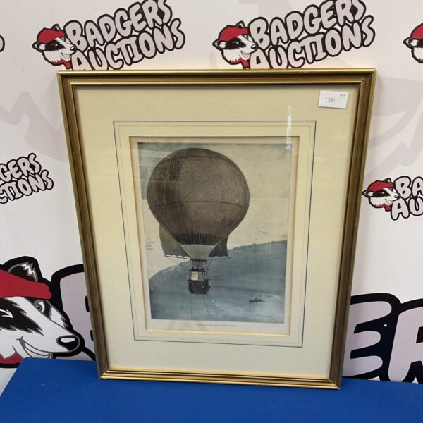 Framed vintage print of a hot air balloon, titled “The Eagle”.