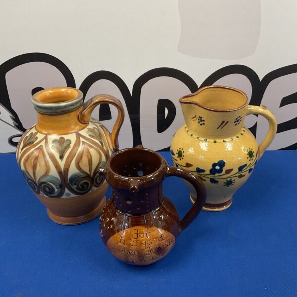 Vintage Langley pottery jug with floral design.