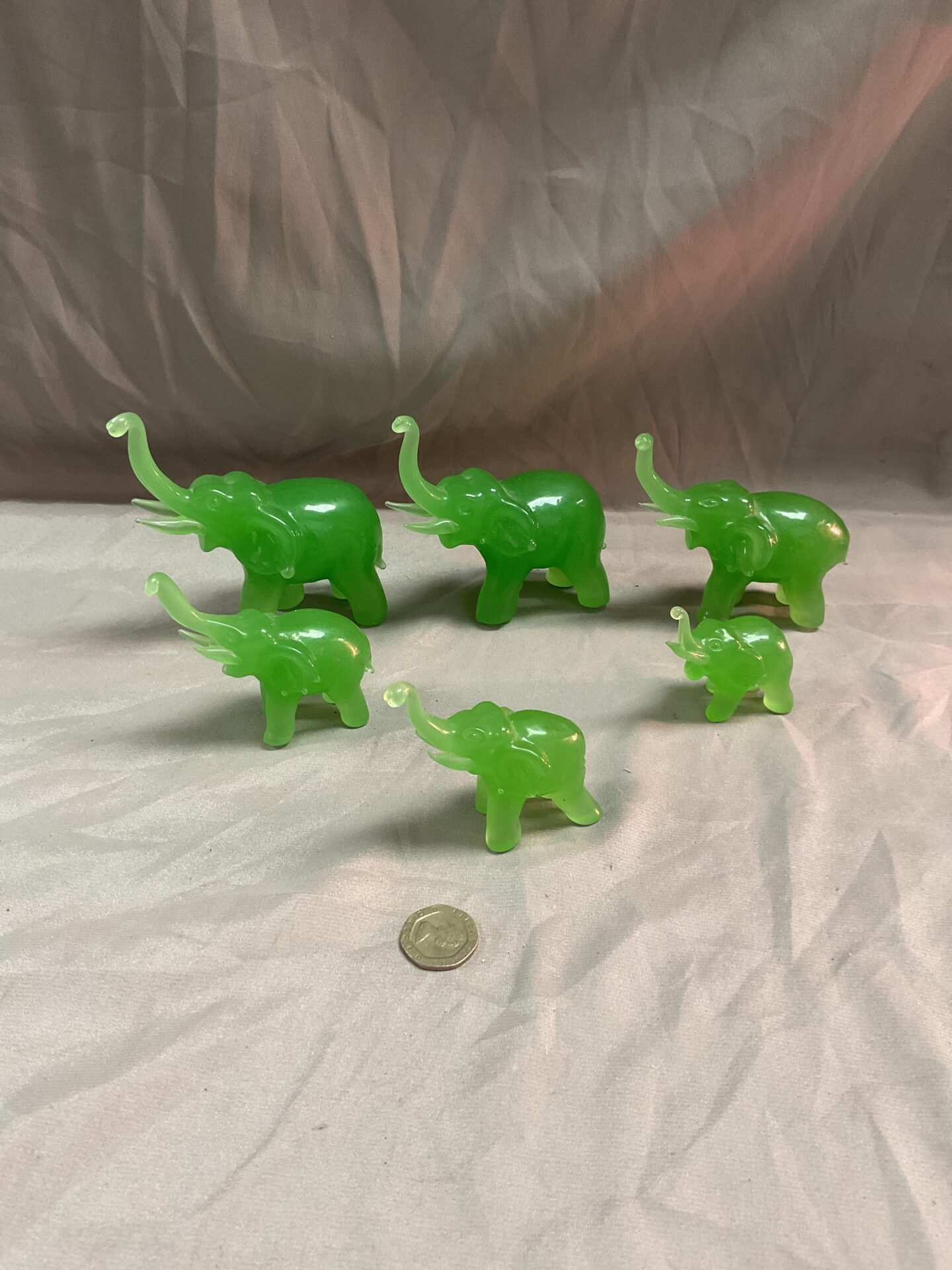 953 Set of six graduated jadite elephants