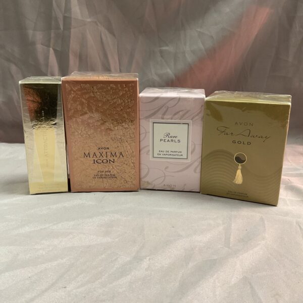 Sealed Avon eau de parfum bottles in a collectible lot.
