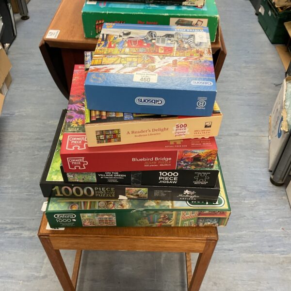 Vintage mixed puzzle bundle with colourful boxes and designs.