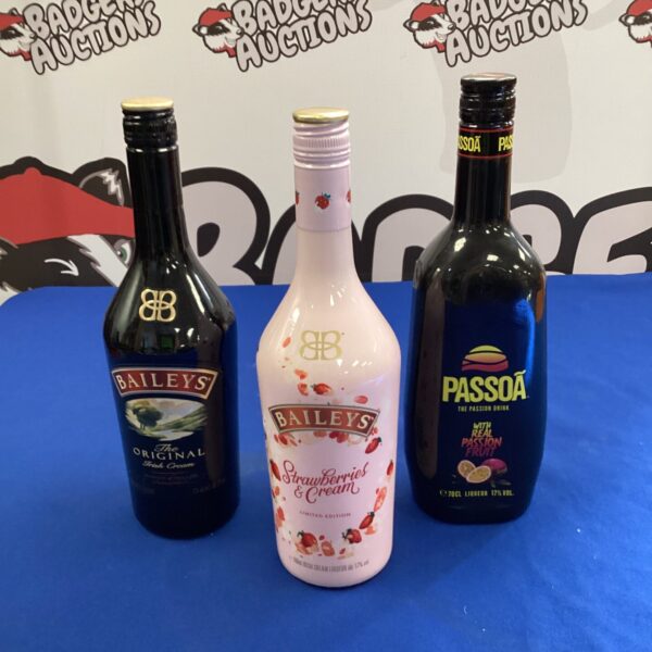 Alcohol spirits lot featuring Baileys and Passoa bottles.