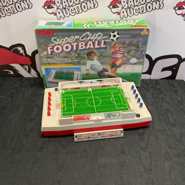 Vintage Tomy SuperCup Football game with figures and ball.
