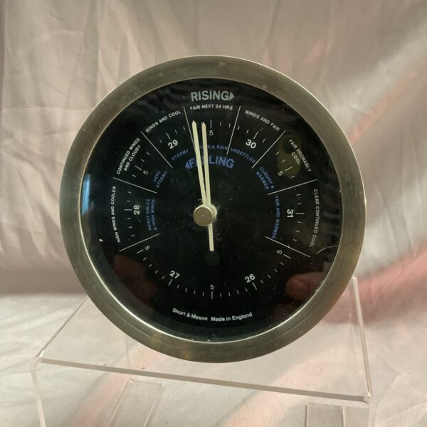 Antique Short & Mason desk barometer with brass casing and weather dial.