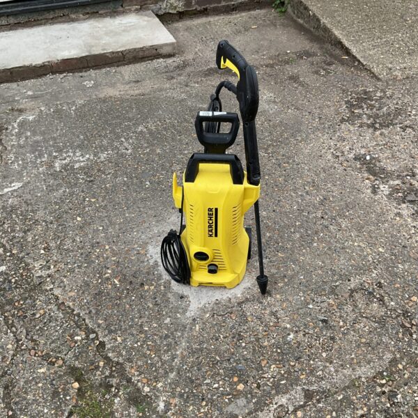 Front view of a Karcher pressure washer, ideal for garden cleaning.
