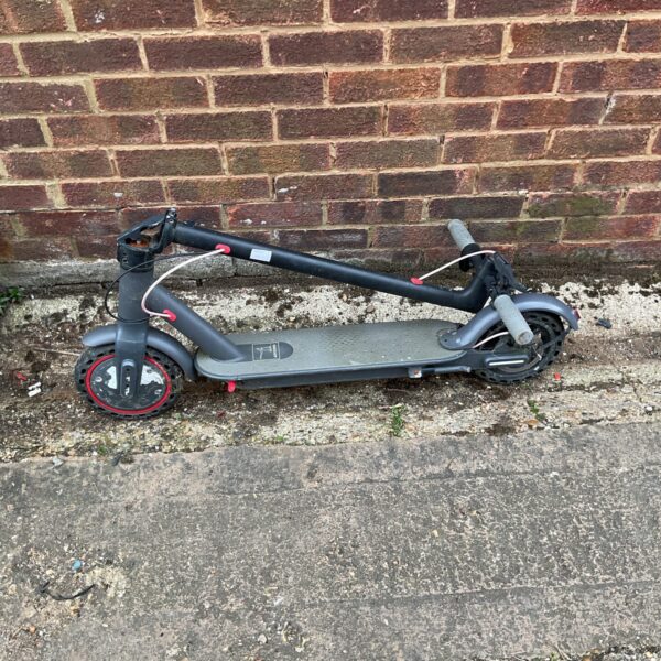 Foldable Aovopro electric scooter in untested condition.