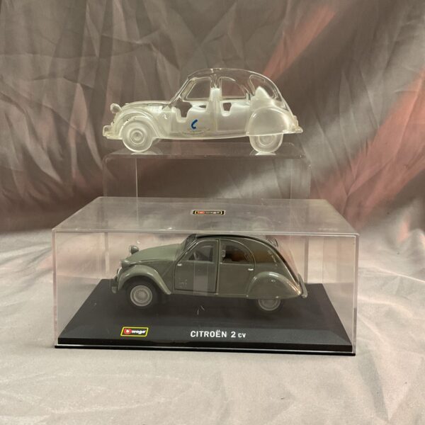 Detailed Burago Citroen 2CV diecast model car on display.