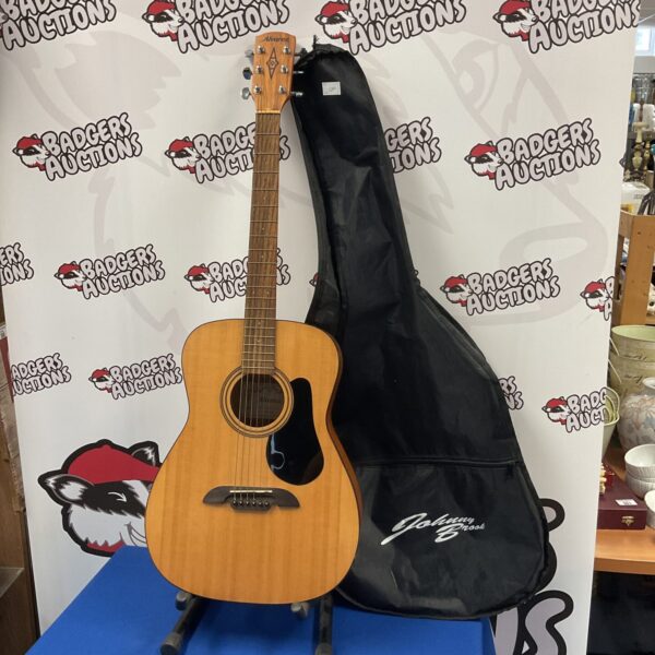 Used Alvarez RF12GB acoustic guitar with included case.