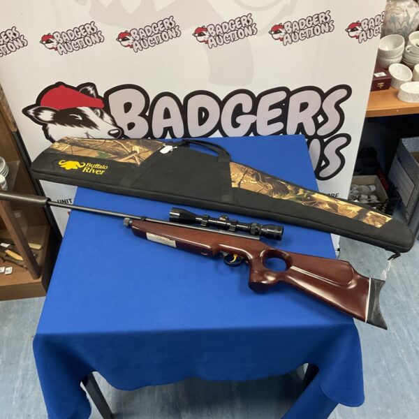 SMK TH78D bolt action air rifle with camo gun slip for sale.