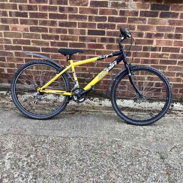 Yellow Raleigh Firefly bike, vintage children's bicycle.