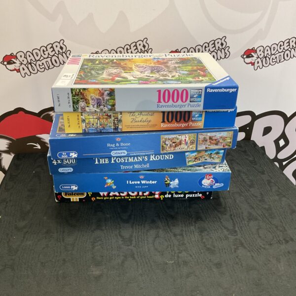Mixed lot of Ravensburger jigsaw puzzles for family entertainment.
