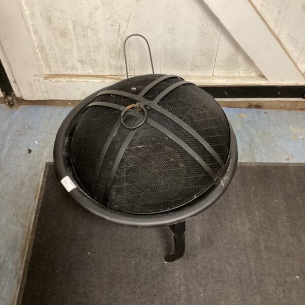 Small metal garden fire pit with mesh bowl and legs.