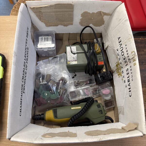 Proxxon model maker multi tool with attachments and power supply.