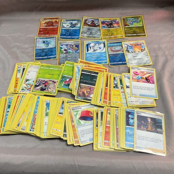Large lot of Pokemon trading cards for collectors and players.