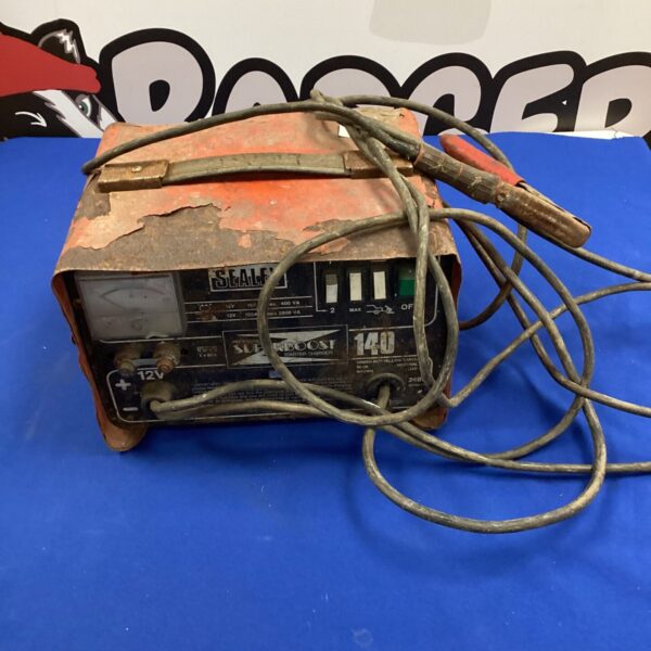 Front view of a vintage Sealey Super Boost starter charger.