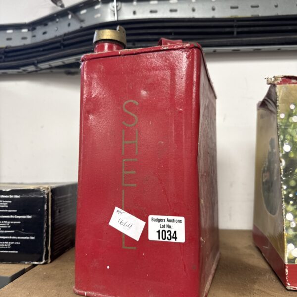 Vintage Shell fuel can with brass cap, collectible petroliana.