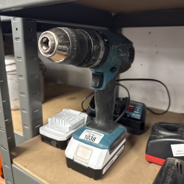Makita cordless drill with two batteries and charger, DIY tool.
