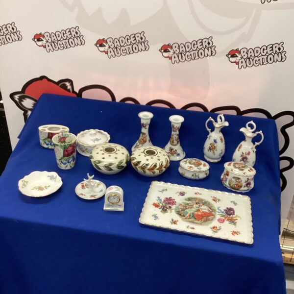 Vintage Aynsley porcelain collection with floral designs.